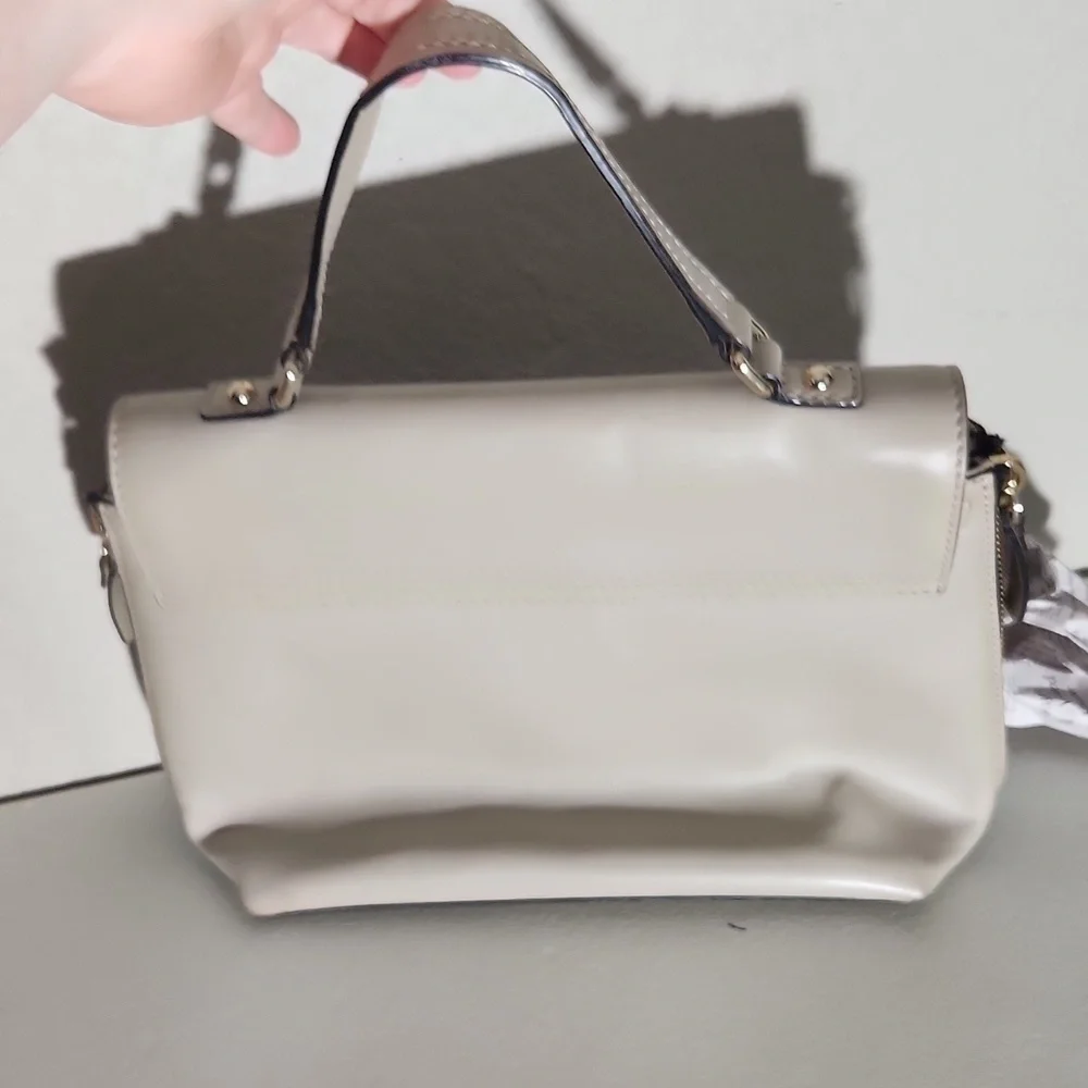 Kate Spade Purse good condion has some scuffs -latch and indent strap non ks